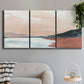 Three-panel canvas wall art featuring quiet coastline with distant horizon, displayed in a modern living room above a sofa.