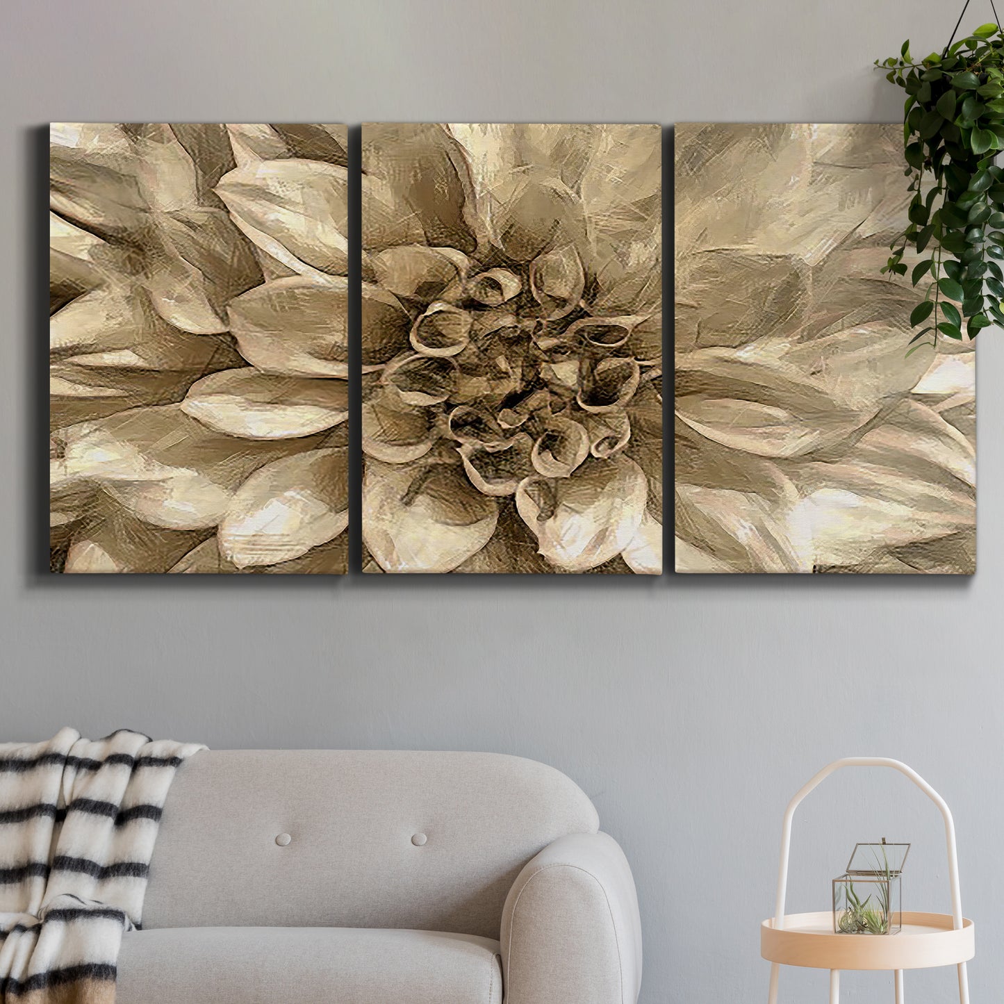 Three-panel canvas wall art featuring monochrome floral linework composition, displayed in a modern living room above a sofa.