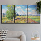 Three-panel canvas wall art featuring sunlit meadow landscape, displayed in a modern living room above a sofa.