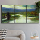 Three-panel canvas wall art featuring open meadow landscape with distant hills, displayed in a modern living room above a sofa.