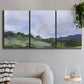 Three-panel canvas wall art featuring wide open pastoral horizon landscape, displayed in a modern living room above a sofa.