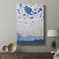 Canvas art print featuring a dramatic cloudscape under a bright night sky with visible stars displayed in a modern interior space.