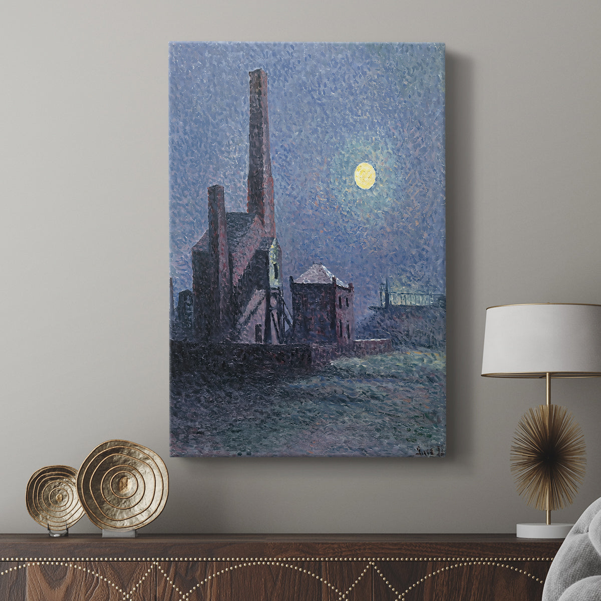 Canvas art print featuring a night scene with buildings and subtle color contrast displayed in a modern interior space.