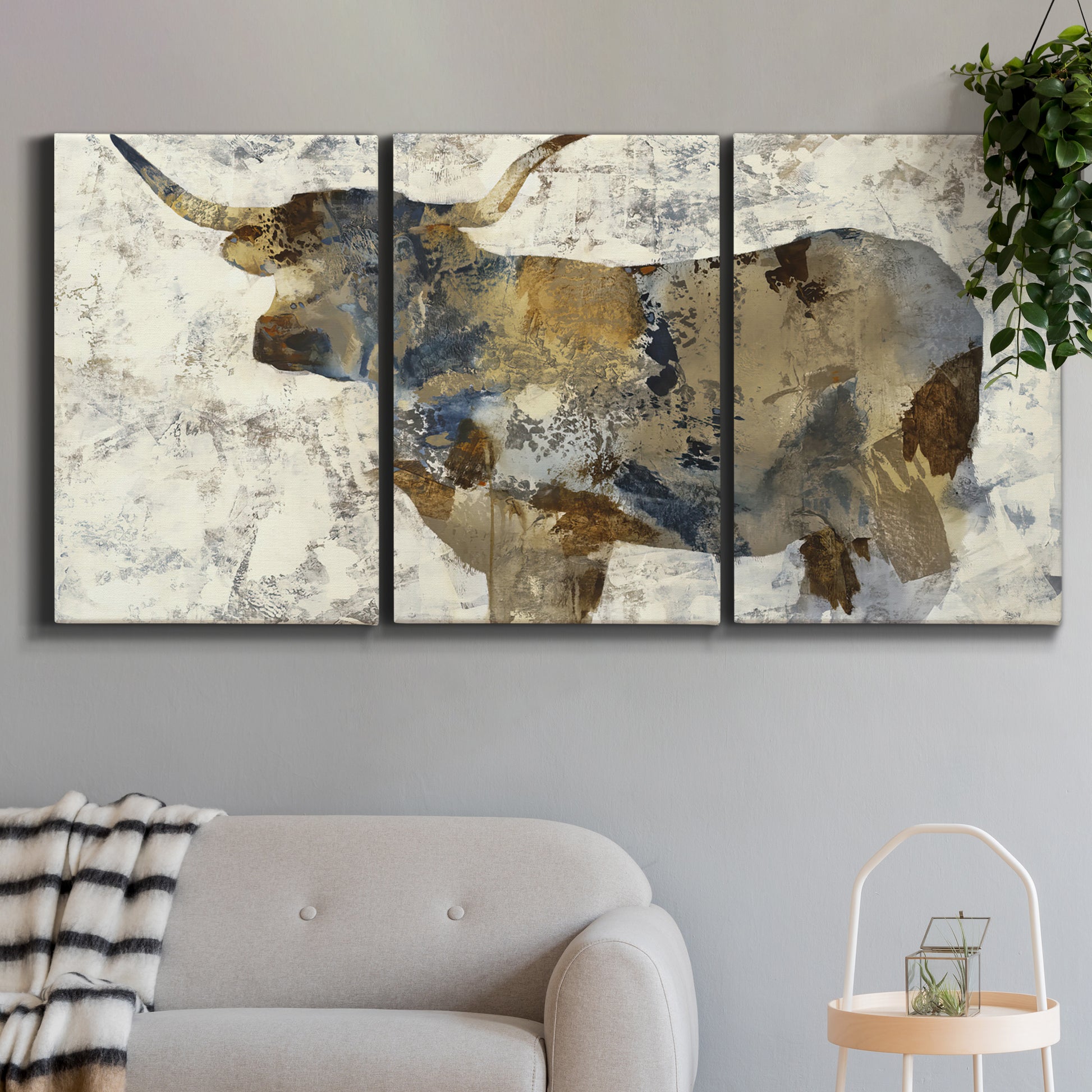 Three-panel canvas wall art featuring farm animal portrait in rustic setting, displayed in a modern living room above a sofa.