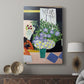 Canvas art print featuring a quiet figure with book and bold color separation displayed in a modern interior space.
