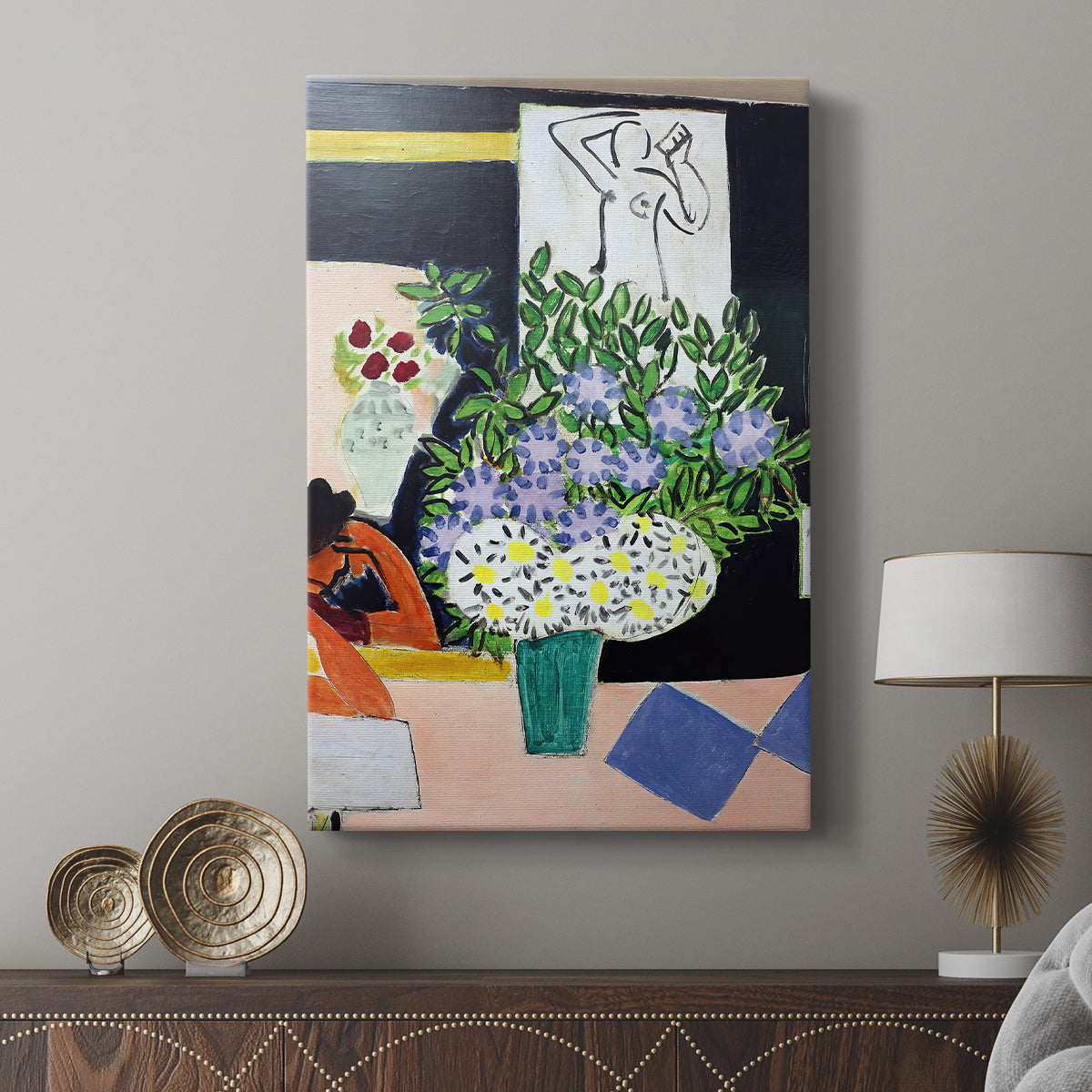 Canvas art print featuring a quiet figure with book and bold color separation displayed in a modern interior space.