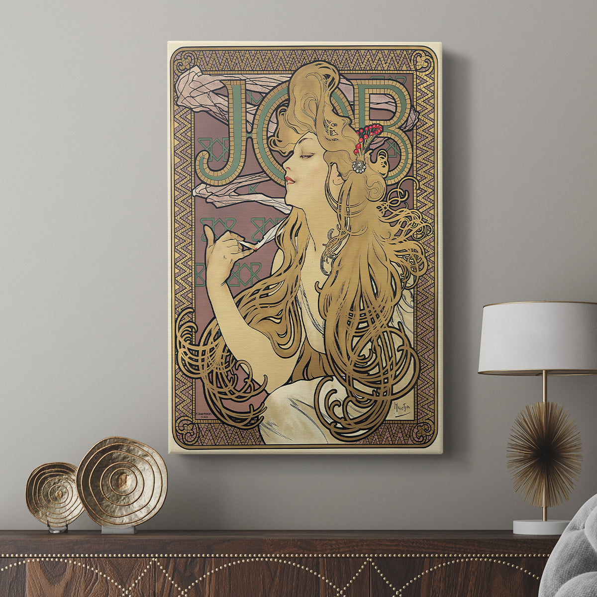 Canvas art print featuring a decorative poster with strong graphic lines and warm tones displayed in a modern interior space.