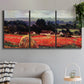 Three-panel canvas wall art featuring red poppy field near barn, displayed in a modern living room above a sofa.