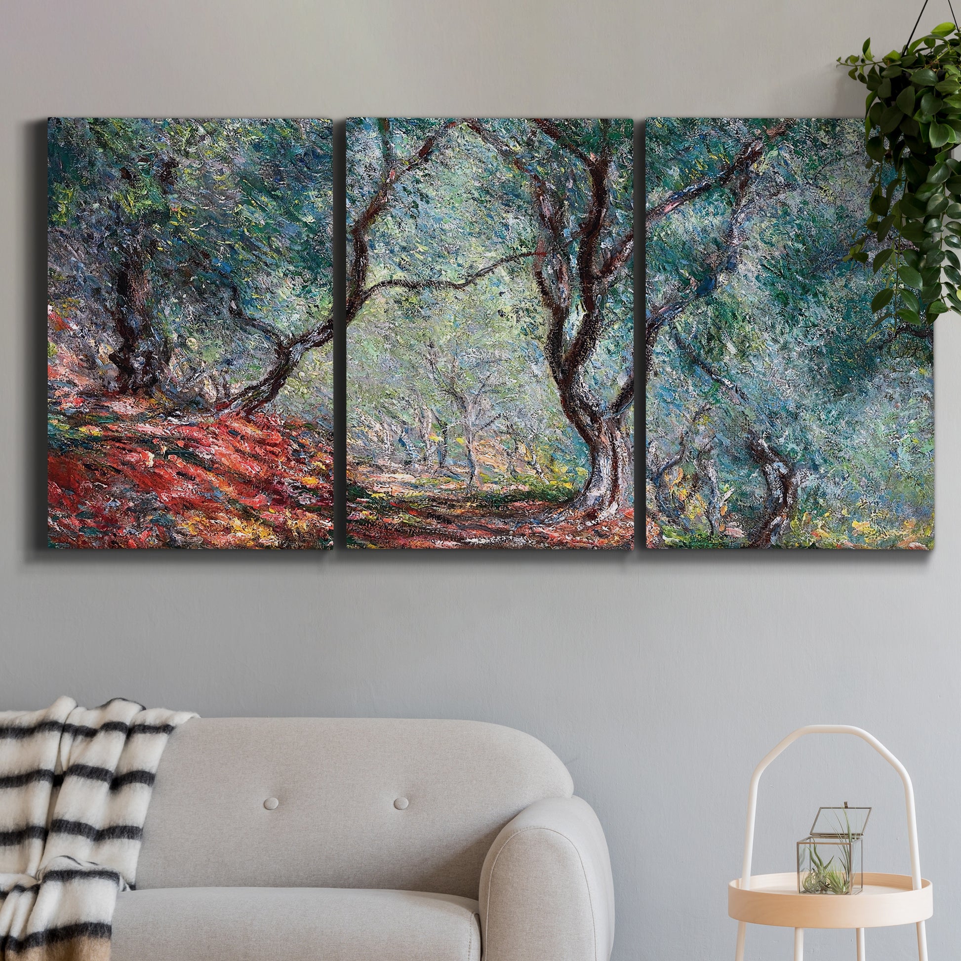 Three-panel canvas wall art featuring olive trees in sunlit garden, displayed in a modern living room above a sofa.