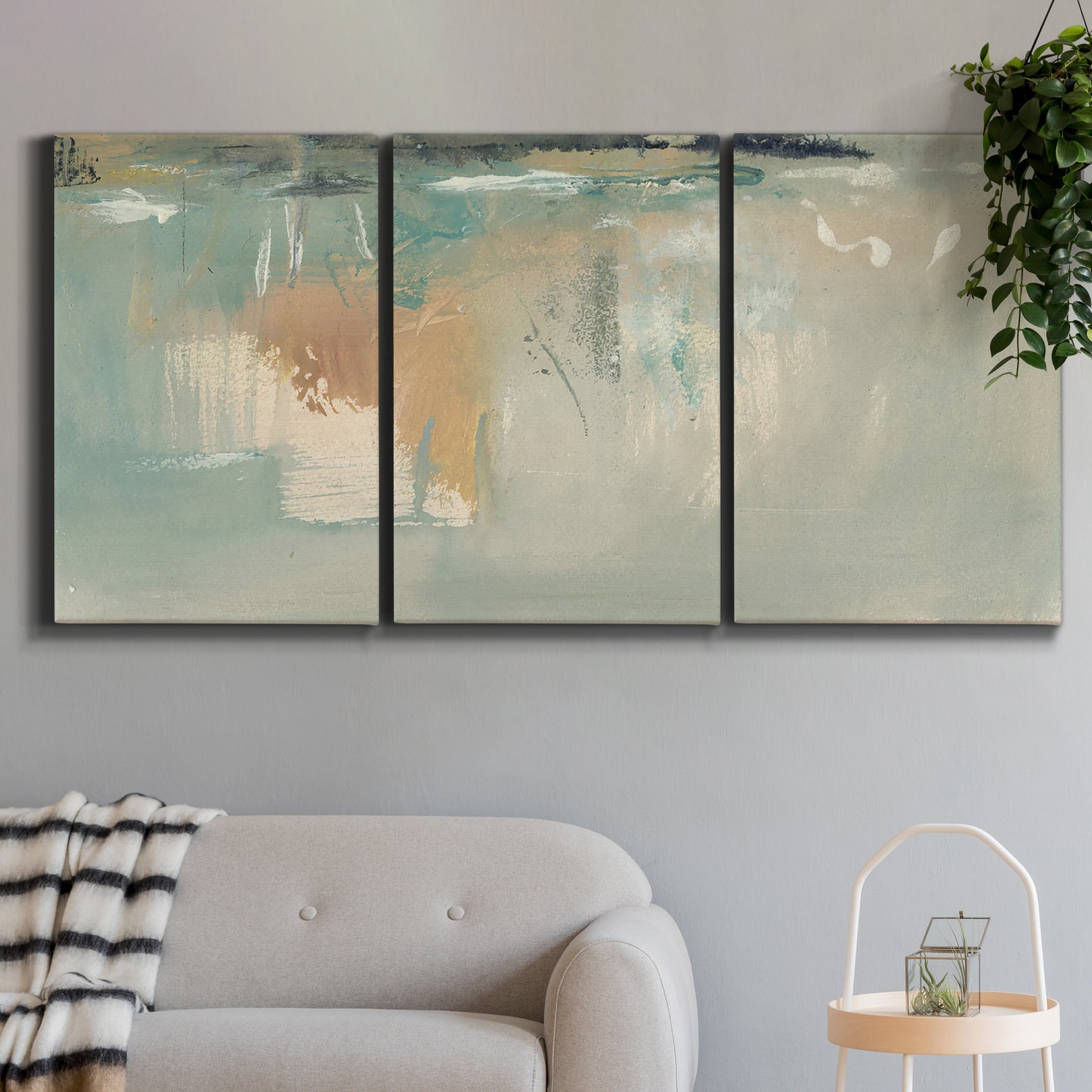 Three-panel canvas wall art featuring minimalist abstract emotional fields, displayed in a modern living room above a sofa.