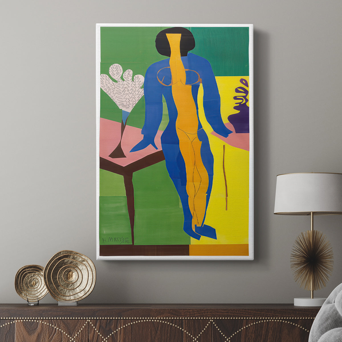 Canvas art print featuring a modern figure built from flat color blocks displayed in a modern interior space.