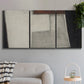 Three-panel canvas wall art featuring geometric abstract roadway motif, displayed in a modern living room above a sofa.