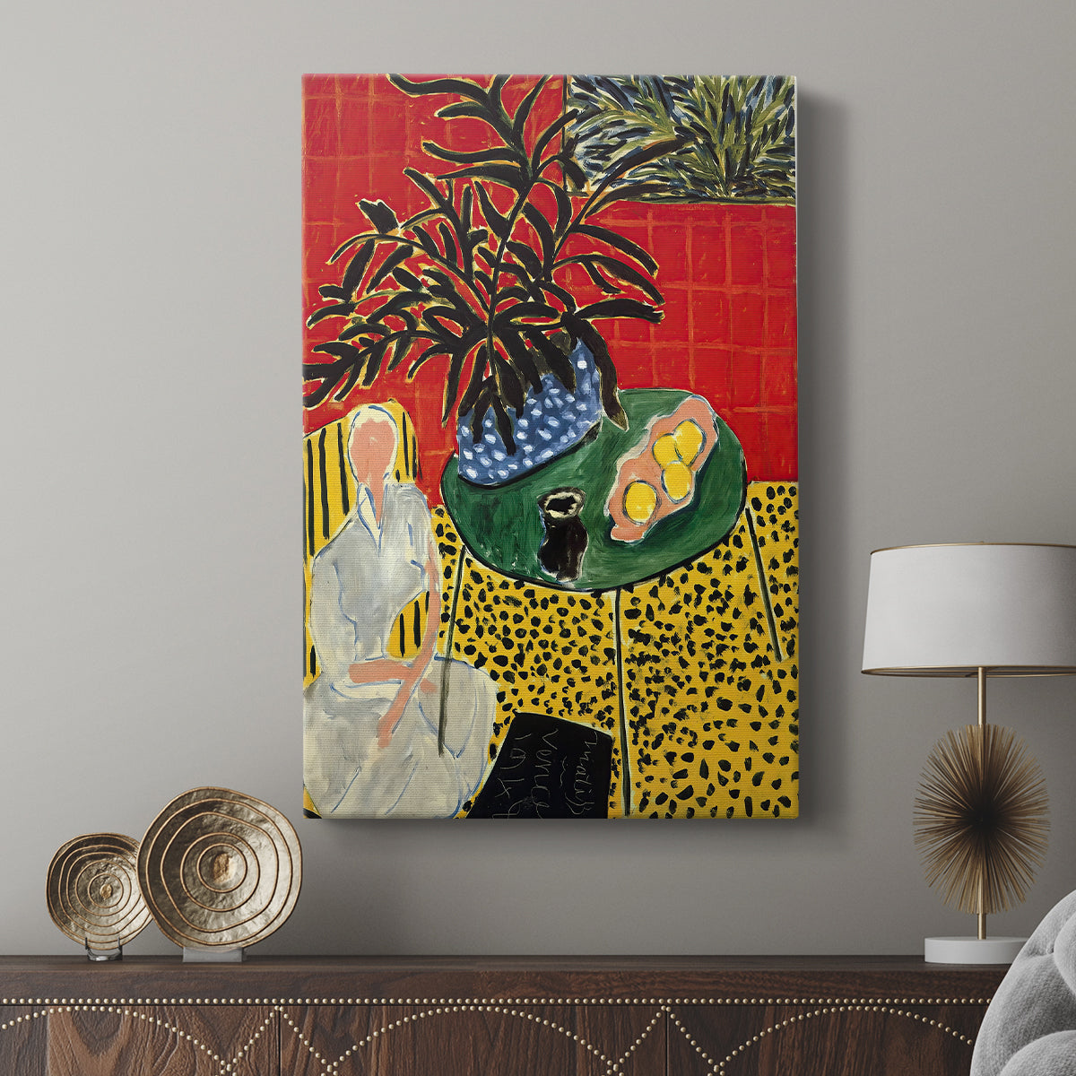 Canvas art print featuring a vivid composition with foliage and layered patterns displayed in a modern interior space.