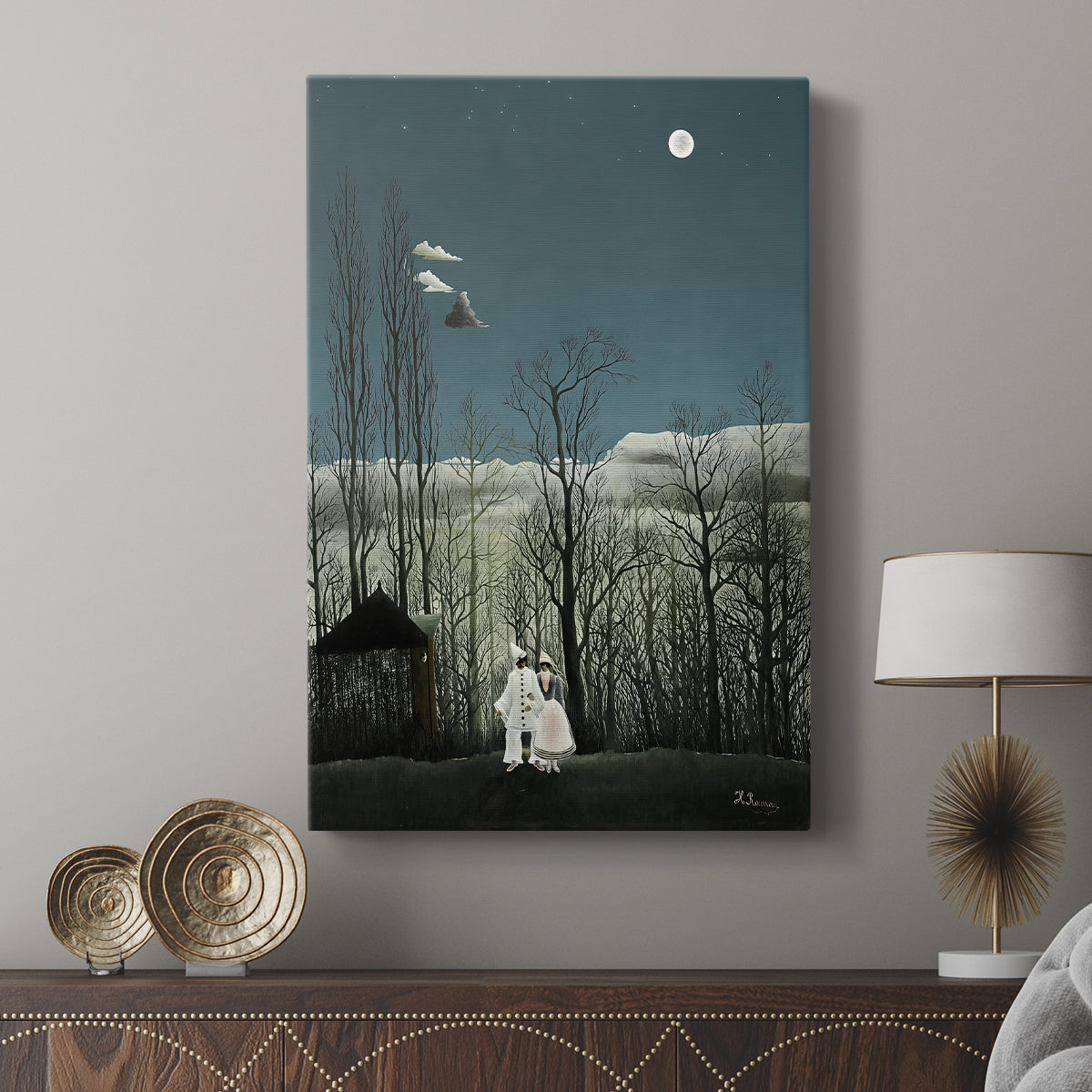 Canvas art print featuring a surreal outdoor scene with still figures and dark foliage displayed in a modern interior space.