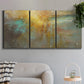 Three-panel canvas wall art featuring muted abstract river inspired tones, displayed in a modern living room above a sofa.