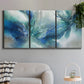 Three-panel canvas wall art featuring subtle abstract light flicker composition, displayed in a modern living room above a sofa.