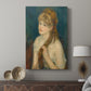 Canvas art print featuring a quiet moment of a woman grooming with warm tones displayed in a modern interior space.