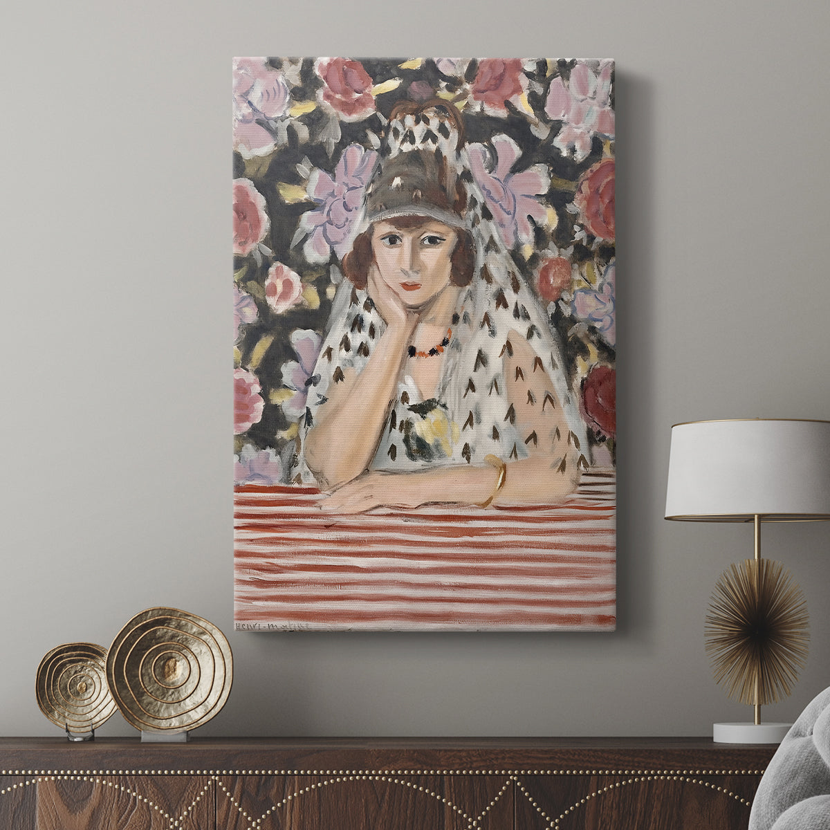 Canvas art print featuring a vibrant portrait with simplified form and strong contrast displayed in a modern interior space.