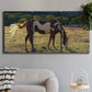 Three-panel canvas wall art featuring horses standing near farmhouse, displayed in a modern living room above a sofa.
