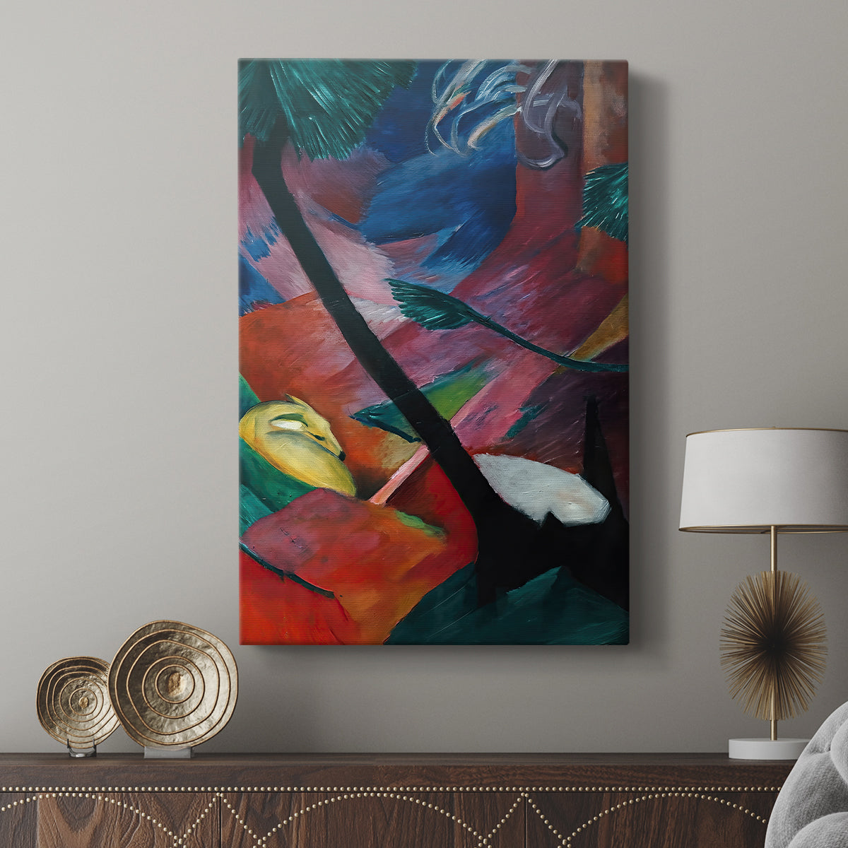 Canvas art print featuring a vivid composition with deer and layered color fields displayed in a modern interior space.