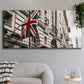 Three-panel canvas wall art featuring london street scene photograph, displayed in a modern living room above a sofa.