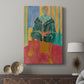 Canvas art print featuring a stylized portrait with decorative patterns and strong color displayed in a modern interior space.