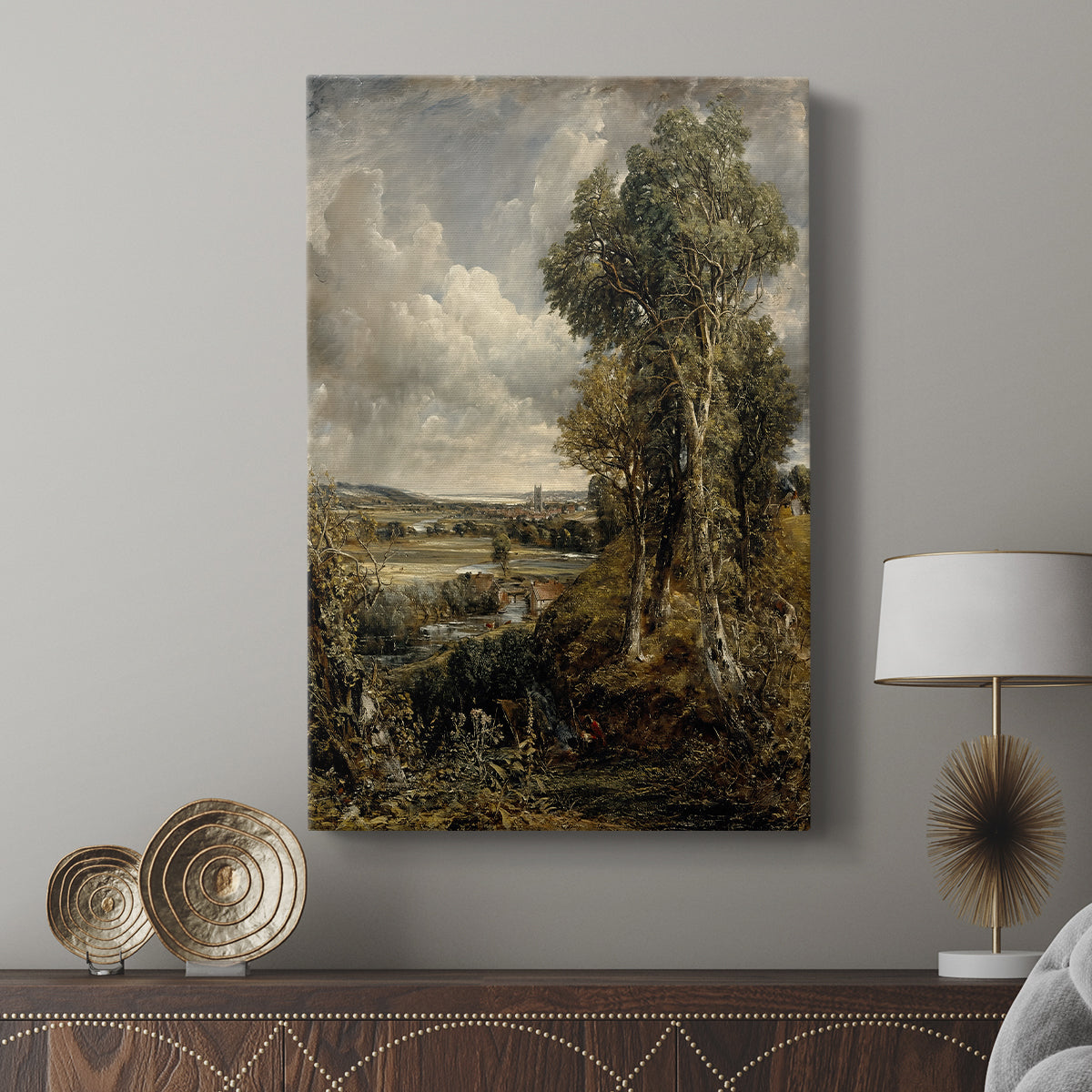 Canvas art print featuring a peaceful landscape with natural tones and open sky displayed in a modern interior space.