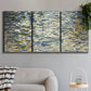 Three-panel canvas wall art featuring abstract water surface reflections, displayed in a modern living room above a sofa.