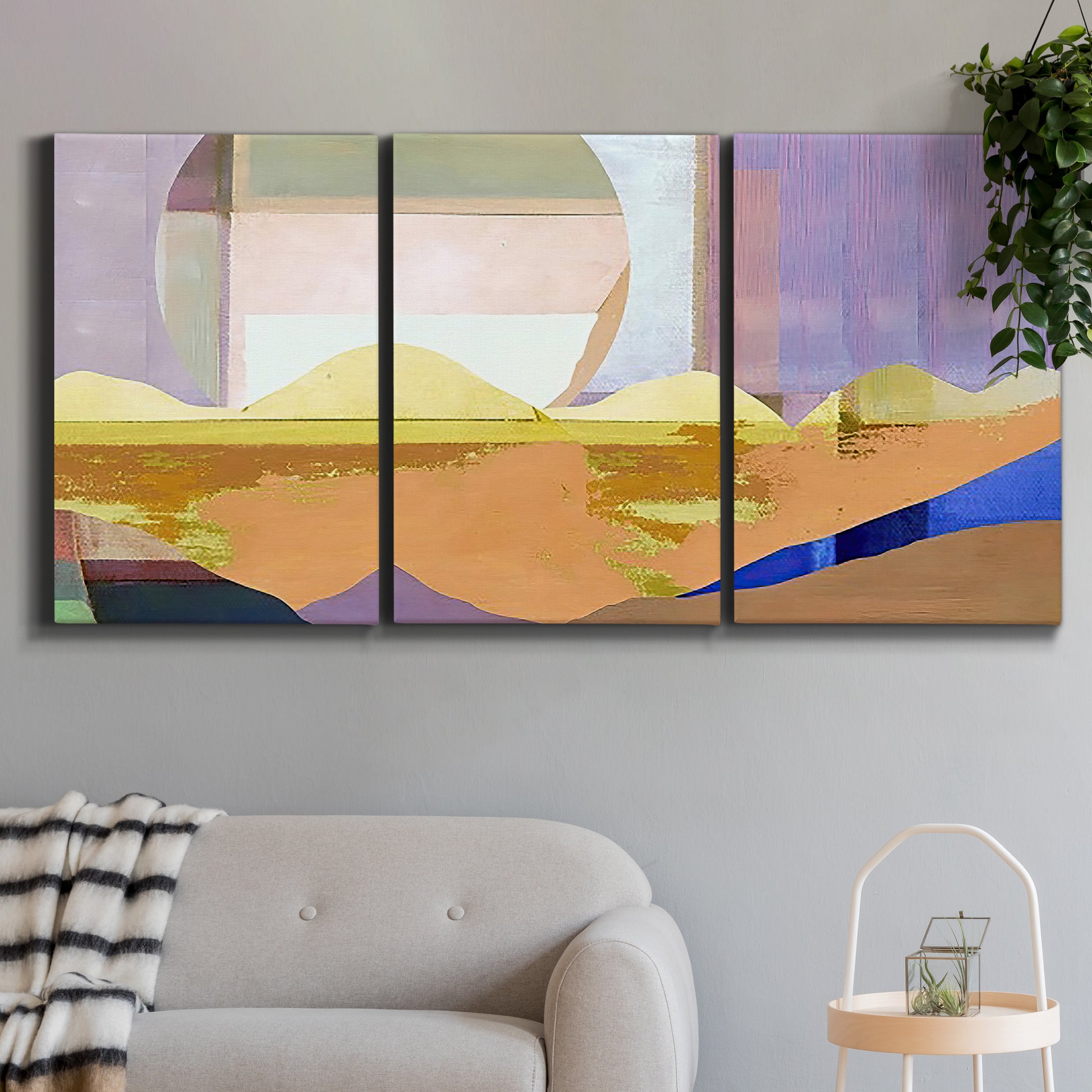 Three-panel canvas wall art featuring mid century geometric pink abstraction, displayed in a modern living room above a sofa.