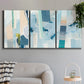 Three-panel canvas wall art featuring layered geometric abstract strata forms, displayed in a modern living room above a sofa.