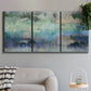 Three-panel canvas wall art featuring cool dreamy abstraction, displayed in a modern living room above a sofa.