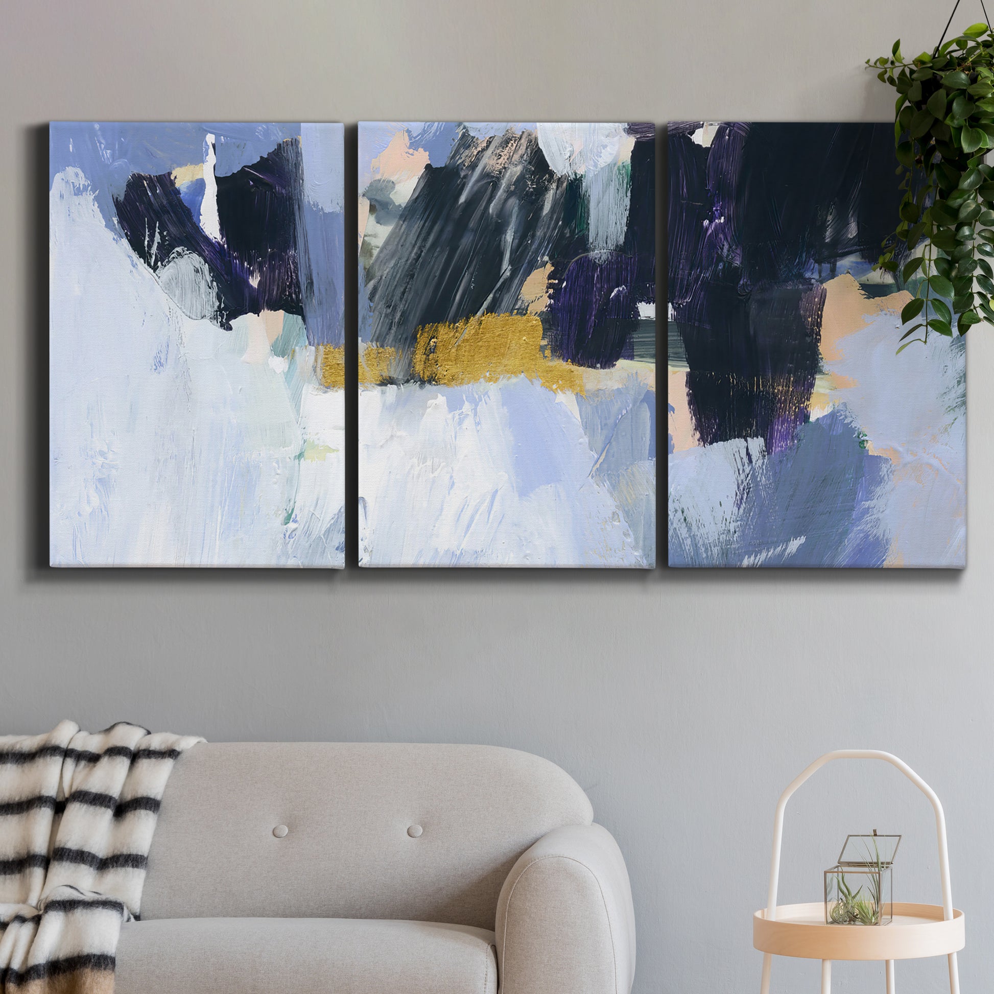 Three-panel canvas wall art featuring icy abstract arctic ledge, displayed in a modern living room above a sofa.