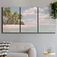 Three-panel canvas wall art featuring tropical sand dunes with palms, displayed in a modern living room above a sofa.