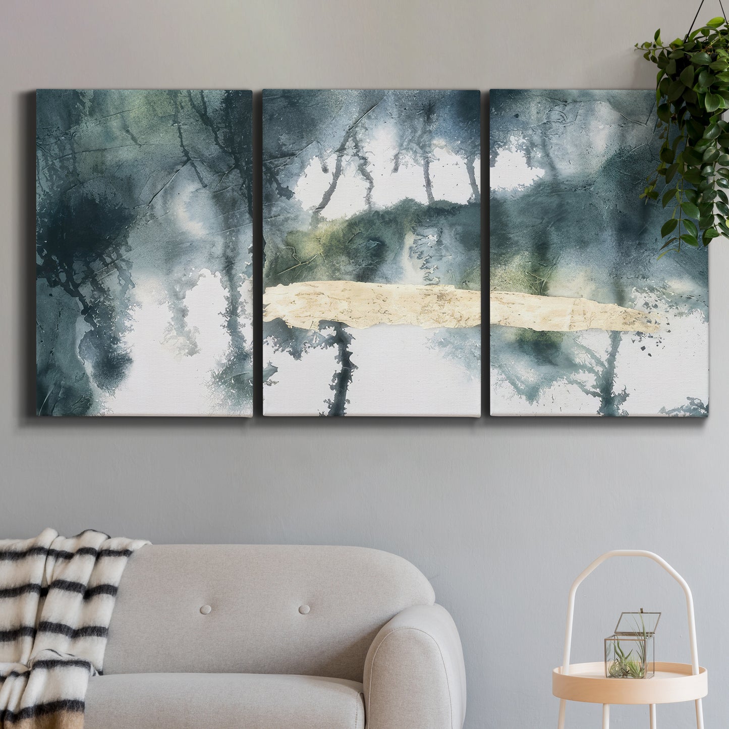 Three-panel canvas wall art featuring saturated abstract color fields, displayed in a modern living room above a sofa.
