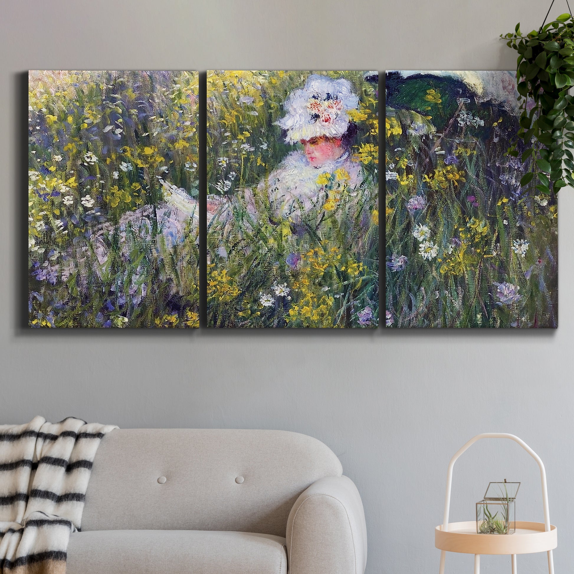 Three-panel canvas wall art featuring woman walking with parasol, displayed in a modern living room above a sofa.