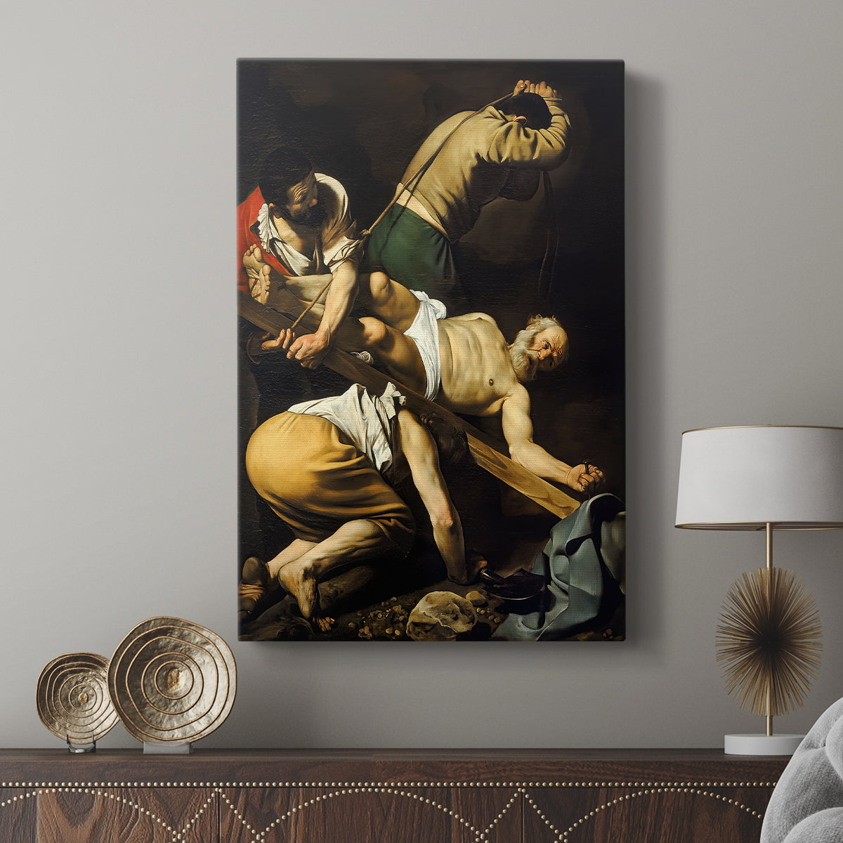 Canvas art print featuring a religious scene with muscular forms and strong contrast displayed in a modern interior space.