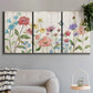 Three-panel canvas wall art featuring delicate wildflower illustration, displayed in a modern living room above a sofa.