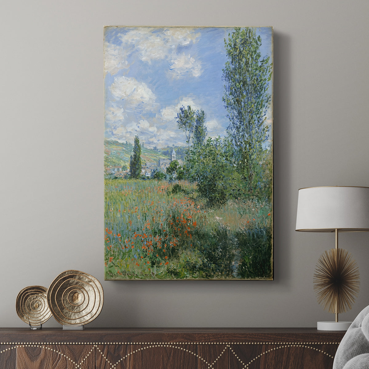 Canvas art print featuring a peaceful landscape with distant buildings and open sky displayed in a modern interior space.