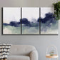 Three-panel canvas wall art featuring misty abstract lake watercolor, displayed in a modern living room above a sofa.