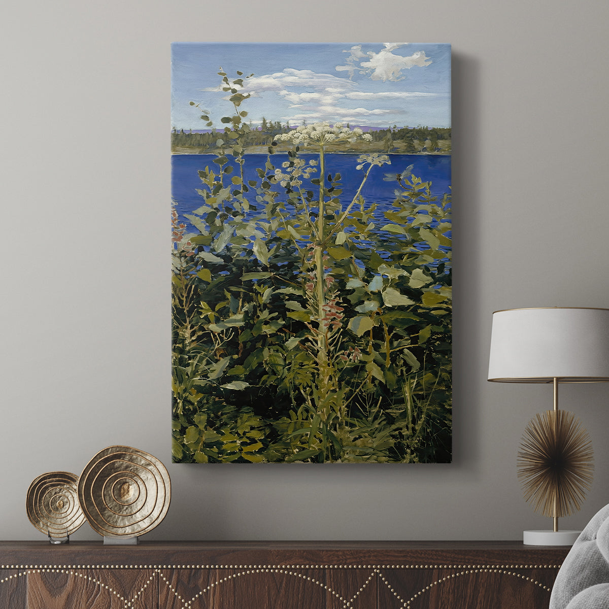 Canvas art print featuring a detailed view of flowering plants in a soft natural setting displayed in a modern interior space.