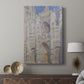 Canvas art print featuring a detailed façade with soft color variations and shadow displayed in a modern interior space.