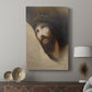 Canvas art print featuring a contemplative figure with subtle contrast and calm presence displayed in a modern interior space.