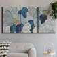 Three-panel canvas wall art featuring mid century geometric pink abstraction, displayed in a modern living room above a sofa.
