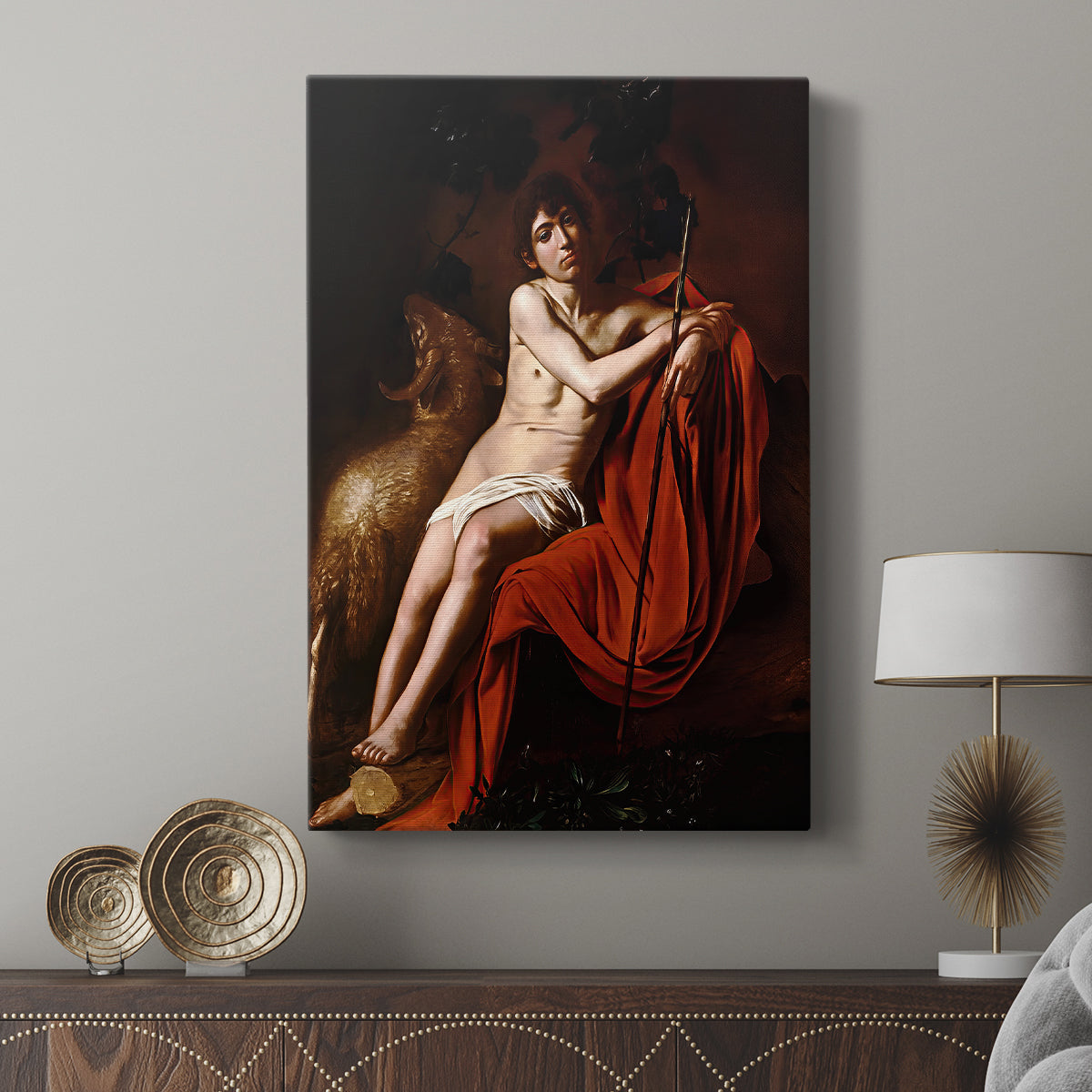 Canvas art print featuring a religious figure with minimal surroundings and dramatic light displayed in a modern interior space.