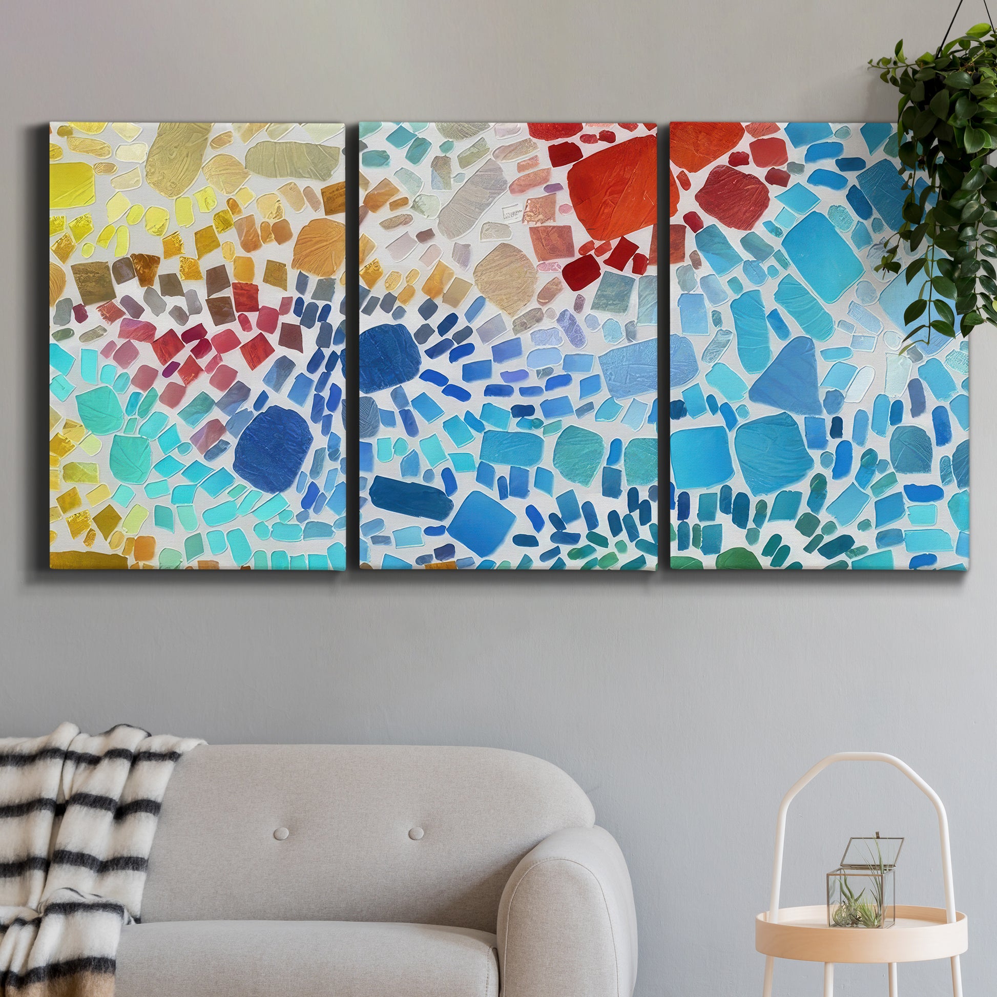 Three-panel canvas wall art featuring open landscape with landing strip, displayed in a modern living room above a sofa.