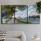 Three-panel canvas wall art featuring river landscape with boats, displayed in a modern living room above a sofa.