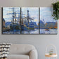 Three-panel canvas wall art featuring industrial dock along harbor, displayed in a modern living room above a sofa.
