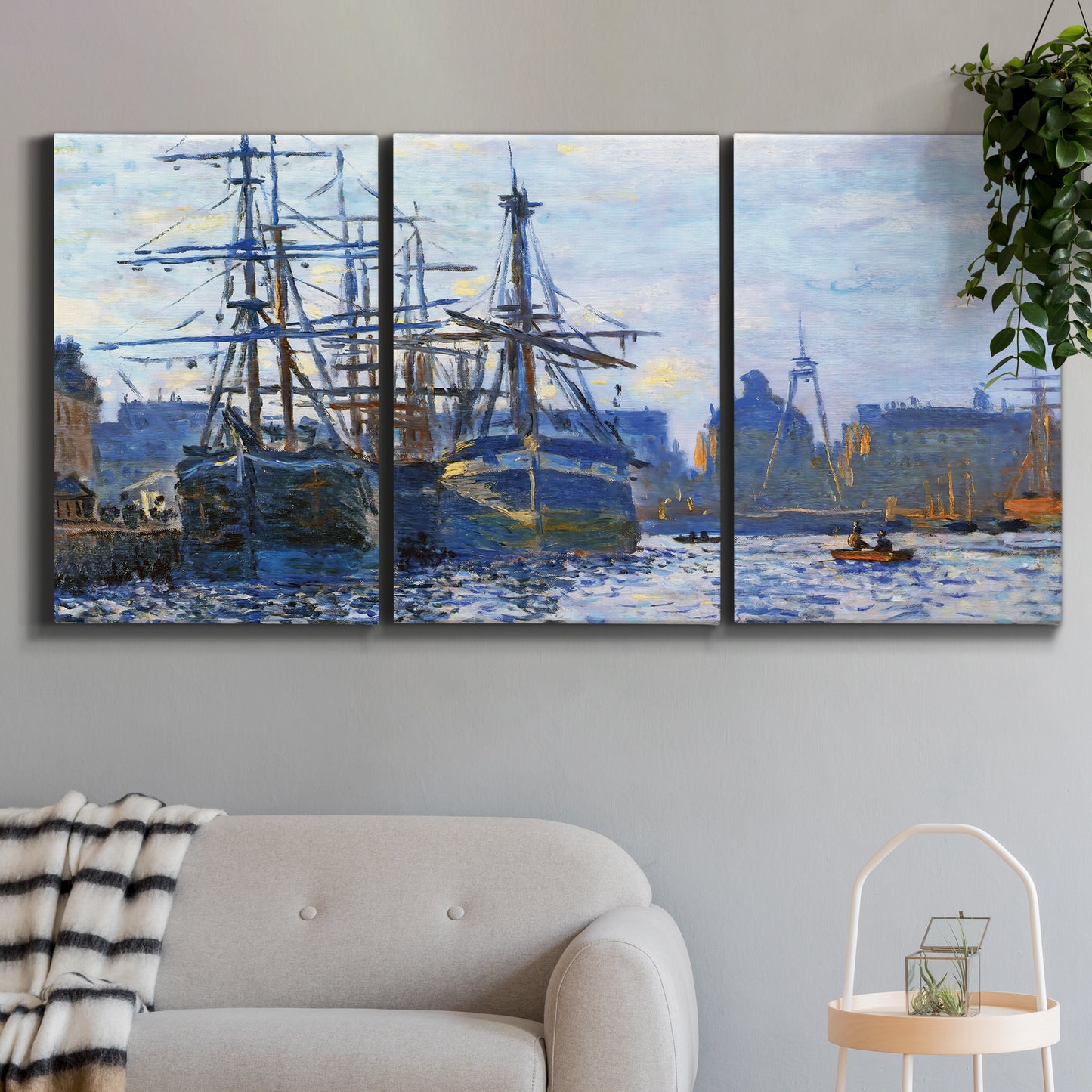 Three-panel canvas wall art featuring industrial dock along harbor, displayed in a modern living room above a sofa.