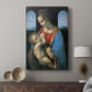 Canvas art print featuring a refined image with figures and subtle shading displayed in a modern interior space.