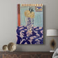 Canvas art print featuring a stylized arrangement of blossoms with flat color and bold design displayed in a modern interior space.